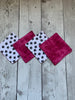 QUILTED COASTERS (reversible) by Rose (Set of 4) - Paw Prints / Pink